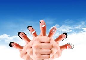 Happy group of finger faces as social network with speech photo