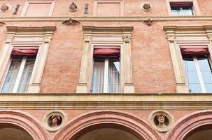 facade of medieval houses in Bologna photo