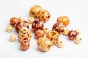 several painted natural wood beads photo