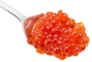above view of spoon with trout salmon red caviar photo