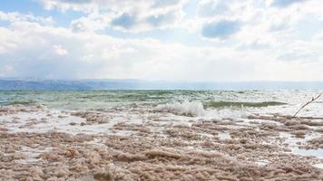 crystalline surface of Dead Sea shore in winter photo