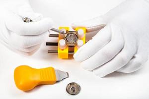 cleaning battery place in quartz wristwatch photo