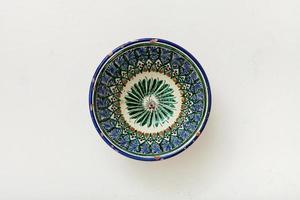 typical central asian bowl on plastering plate photo