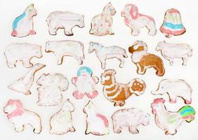 various Christmas figure cookies on white photo