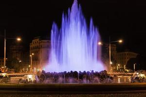 blue fountain on Schwarzenbergplatz square, Vienn photo