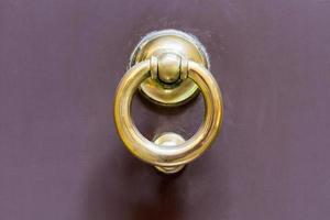 old brass ring door handle photo