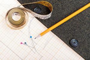pattern, measure tape, pencil, pins, jacket photo