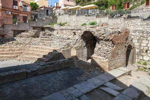 ruins of ancient roman theater Odeon in Taormina photo