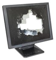 broken monitor with cut out damaged glass screen photo