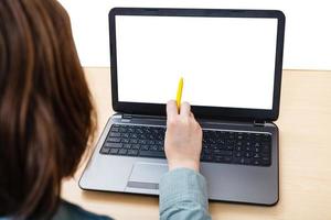 laptop with isolated screen on office desk photo