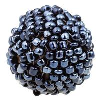 ball from many sewn black glass beads close up photo