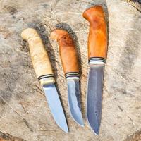 three hand made knives photo