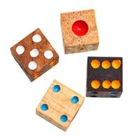 top view of four wooden gambling dices isolated photo