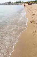 sand beach in Giardini Naxos town in summer photo