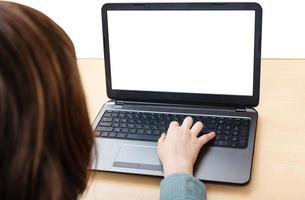 laptop with cutout screen on office table photo