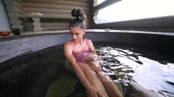 Pretty young woman having a spa day video