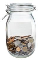 glass jar with empty label and saved money photo