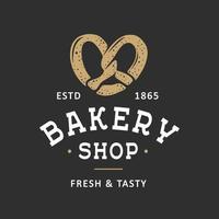 Vintage style bakery shop simple label, badge, emblem, logo template. Graphic food art with engraved pretzel design vector element with typography. Linear organic bagel on black background.