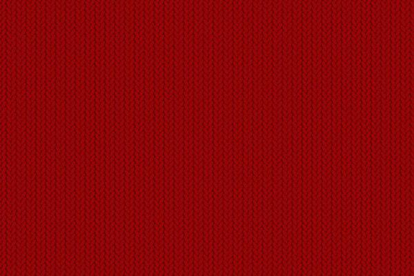 Texture of knitted fabric. Cozy red knitting pattern