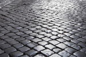 pavimento de adoquines en la ciudad de roma foto