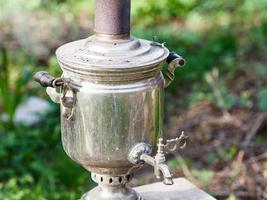 old steel samovar - boiling kettle photo