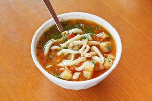 laghman soup in white bowl photo