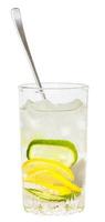 glass tumbler with spoon and cold lemonade photo