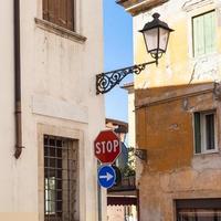 medieval houses on street in Vicenza city photo