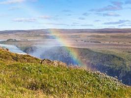 rainbow over canyon of Olfusa river in Iceland photo