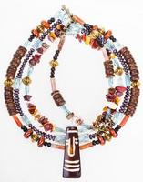 african style necklace from gemstones and coconut photo