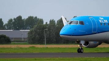 AMSTERDAM, THE NETHERLANDS JULY 27, 2017 - KLM Cityhopper Embraer 175 PH EXJ landing on runway 18R Polderbaan. Shiphol Airport, Amsterdam, Holland video