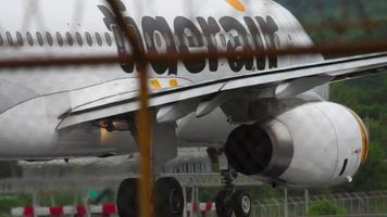 PHUKET, THAILAND NOVEMBER 26, 2017 - Tigerair airbus A320 9V TRW taxiing to the start on the Phuket airport. Mai Khao beach video