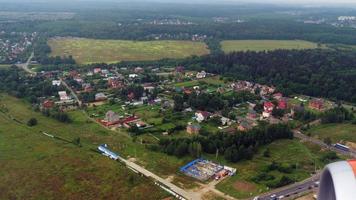 First person view from the airplane window during landing. Kaliningrad region, top view video