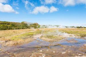 view of Haukadalur hot spring valley in autumn photo