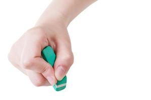 front view of hand with new rubber eraser isolated photo