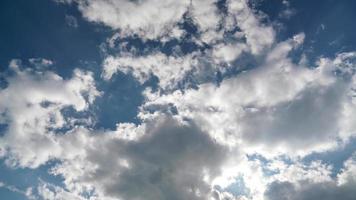 8K Pieces of white foam partly clouds in blue sky video