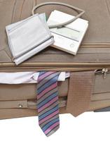 above view of sphygmometer on suitcase with ties photo