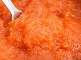 surface of salty caviar of whitefish with spoon photo