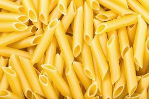 many durum wheat semolina pasta penne lisce photo