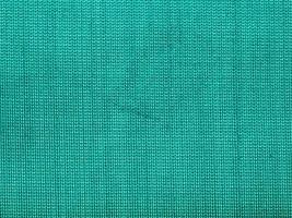 textile background - green silk fabric photo