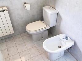 interior of simple white toilet room photo