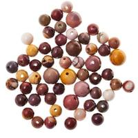 many little beads from mookaite jasper gemstone photo