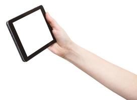 hand holds touchpad with cutout screen photo