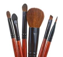 set of makeup brushes isolated on white photo