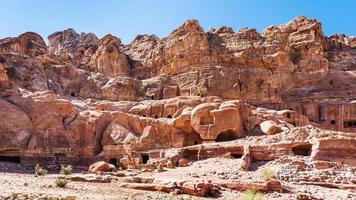 ancient tombs in rocks in Petra town photo