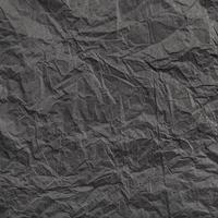 square background from black crumpled paper photo