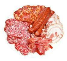 top view of plate with various meat specialties photo