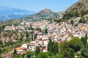 skyline of Taormina city in summer day photo