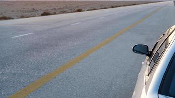 Desert Highway Road 15 in Jordan in evening photo