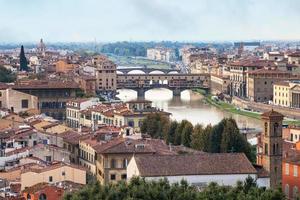 above view city and of ponte vecchio in Florence photo